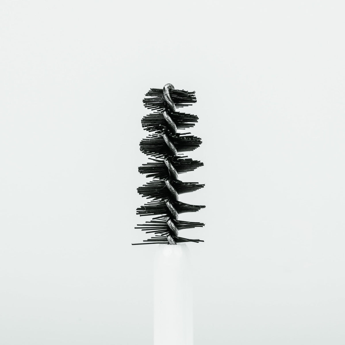 Borboleta Brow Serum packaging on a vanity shelf