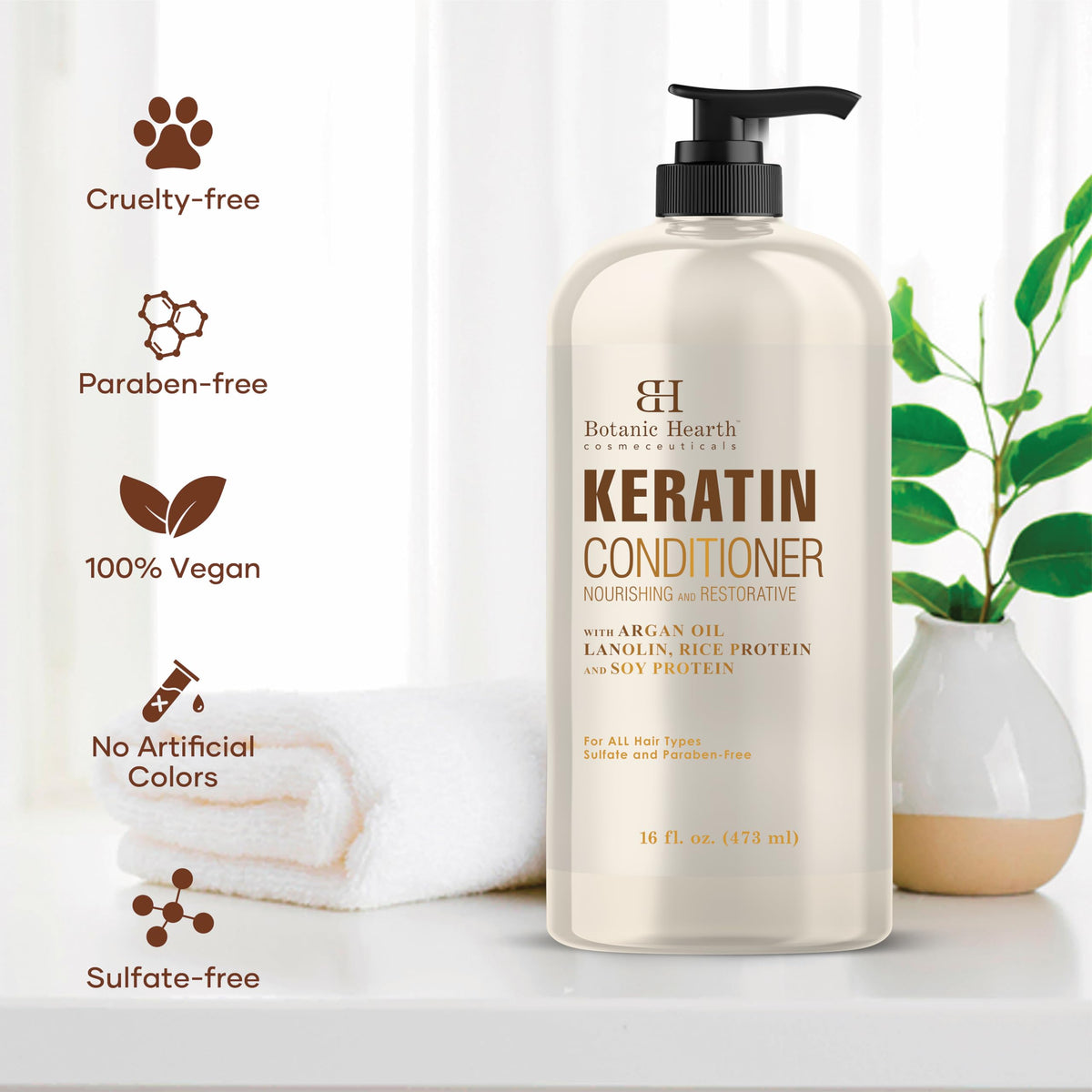 Botanic Hearth conditioner being applied to wet hair for even coverage