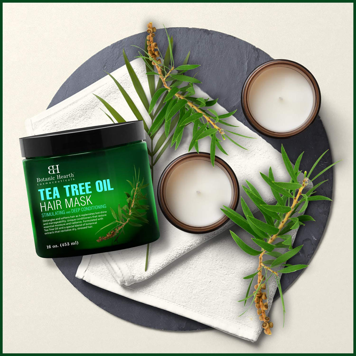Creamy texture of Botanic Hearth Tea Tree Hair Mask on hair.