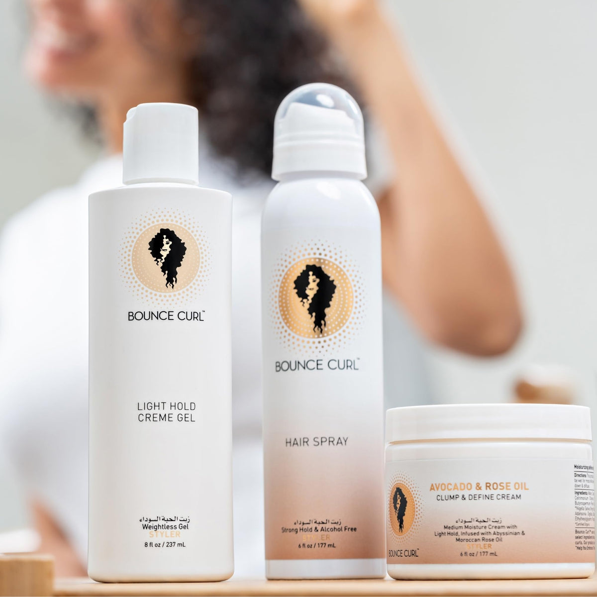 Bounce Curl Alcohol-Free Strong Hold HairSpray being used on hair adds texture and volume.