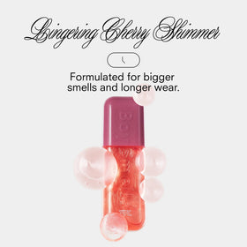 Boy Smells Cherry Slay shimmer glow highlights skin and hair with a radiant finish.