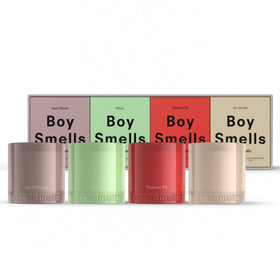 Boy Smells Essentials Quad Votive Set in gift-ready candy-colored glass vessels.