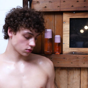 Soft Wood lifestyle spritz on hair for subtle, woody glow
