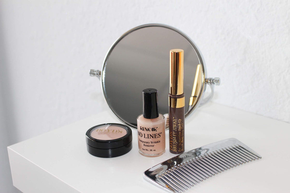 Brush It Away applicator wand for precise coverage on hair.