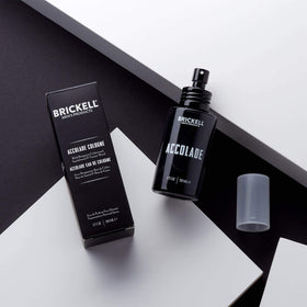 Brickell Accolade cedarwood note image highlights warm, masculine depth.