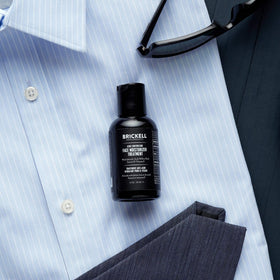 Brickell Men's Acne Moisturizer application scene on clean face ready for routine.