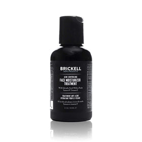 Brickell Men's Acne Moisturizer bottle closeup highlighting 2% salicylic acid for balanced skin hydration.