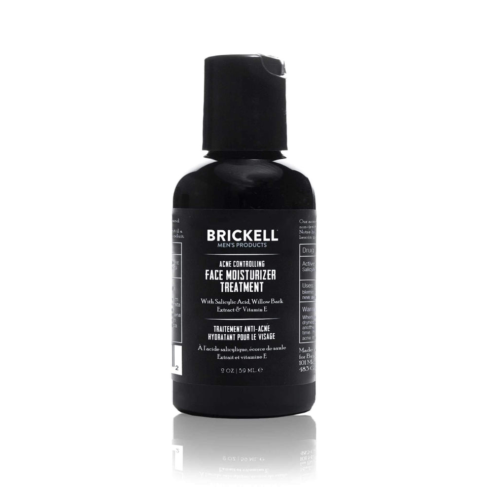 Brickell Men's Acne Moisturizer bottle closeup highlighting 2% salicylic acid for balanced skin hydration.