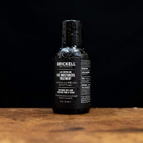 Brickell Men's Acne Moisturizer packaging front showcasing natural, organic ingredients.