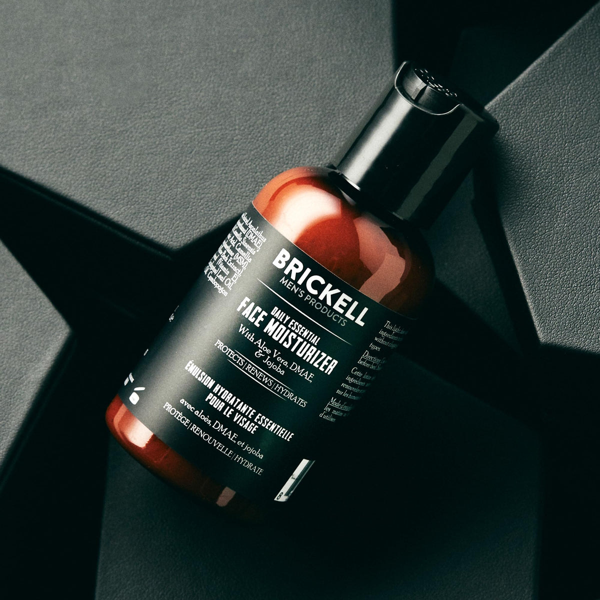 Brickell Men's Daily Essential Face Moisturizer travel-size pack ideal for on-the-go routines.