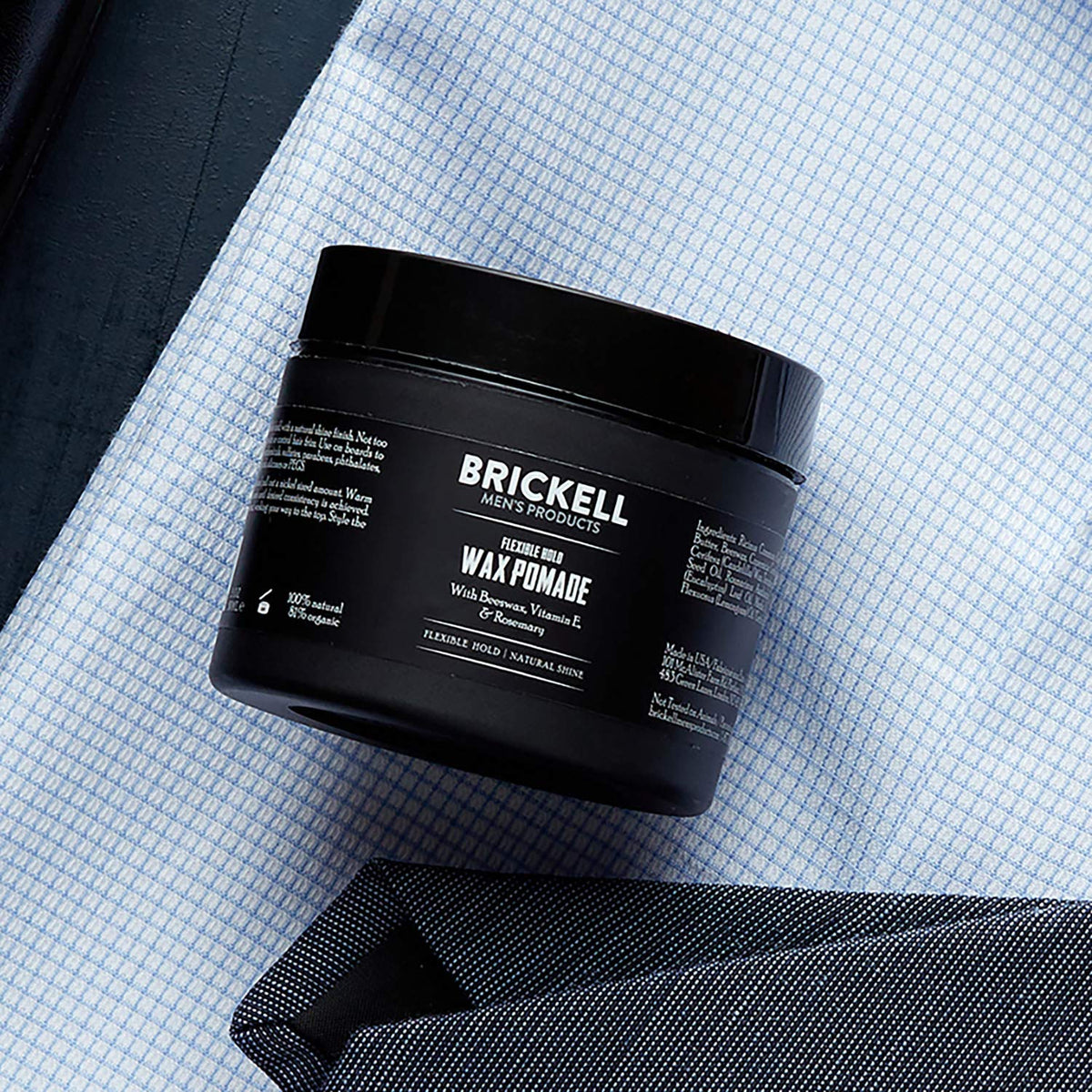 Brickell Men's Flexible Hold Wax Pomade texture close-up emphasizes natural shine and smooth texture.