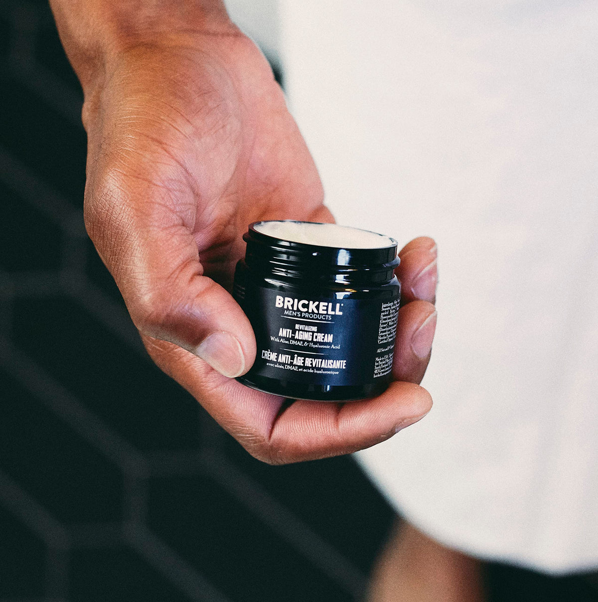 Brickell Night Cream close-up emphasizing overnight rejuvenation for tired skin.