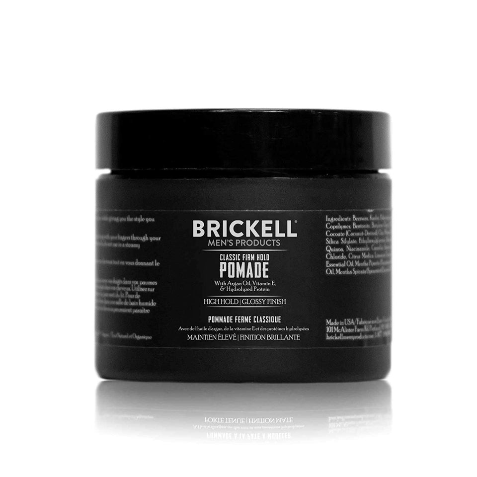 Brickell Men's Hair Styling Pomade bottle closeup highlighting strong hold and glossy finish