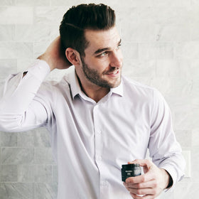 Brickell men's pomade close up highlighting natural ingredients