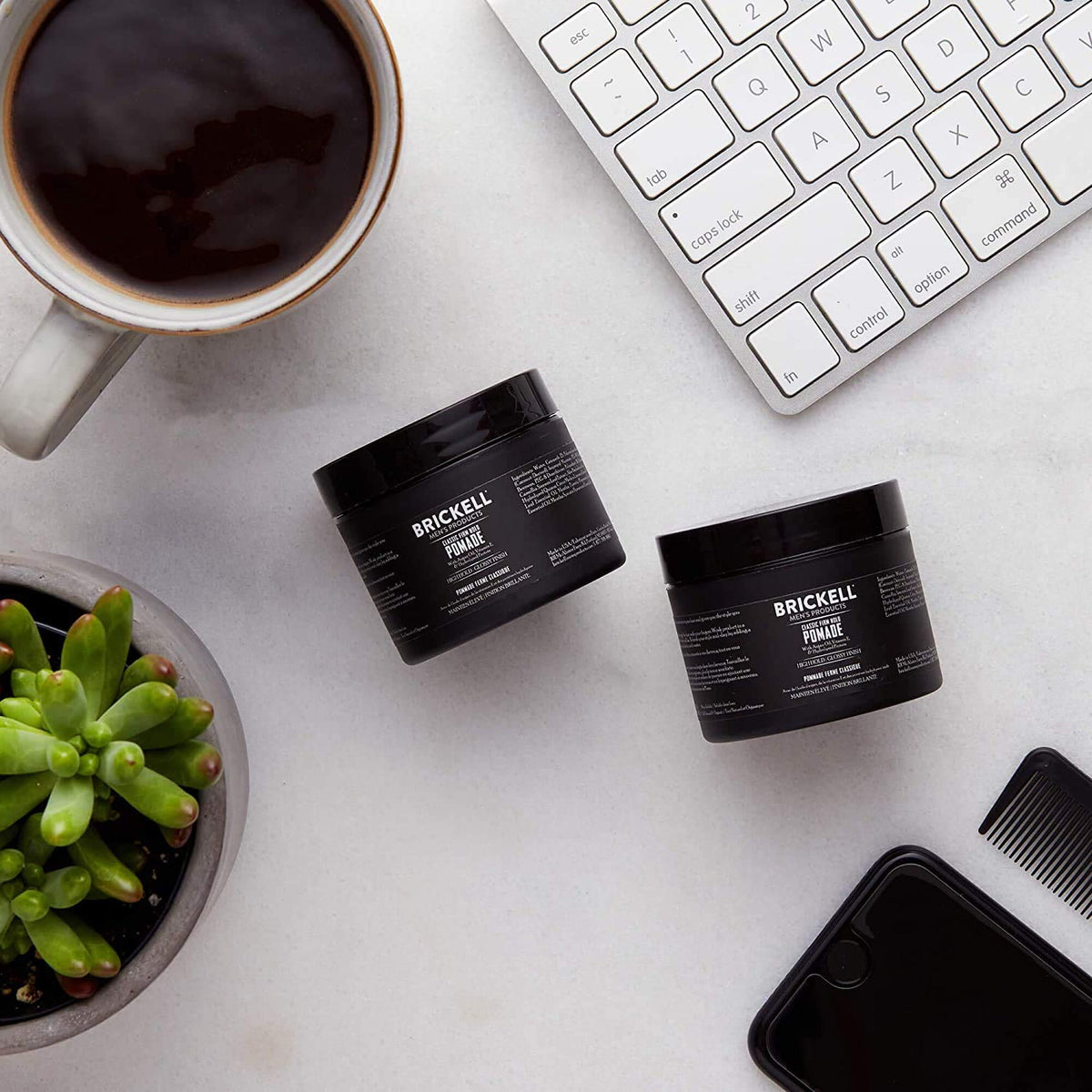 Brickell Men's pomade on glossy hair finish for a polished look