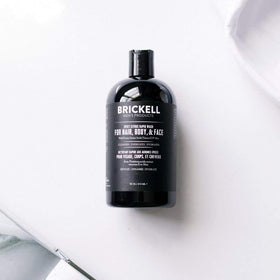 Brickell Men's Rapid Wash lathering in hair for a refreshing shower routine