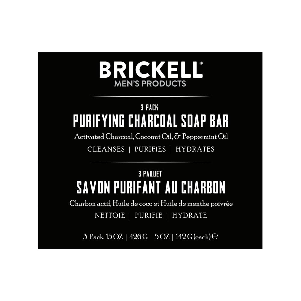 Brickell Purifying Charcoal Soap Bar shows cleansing action with coconut and olive oils.