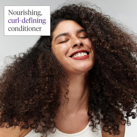 Briogeo Avocado Oil hydration close-up shows deep conditioning for soft hair.
