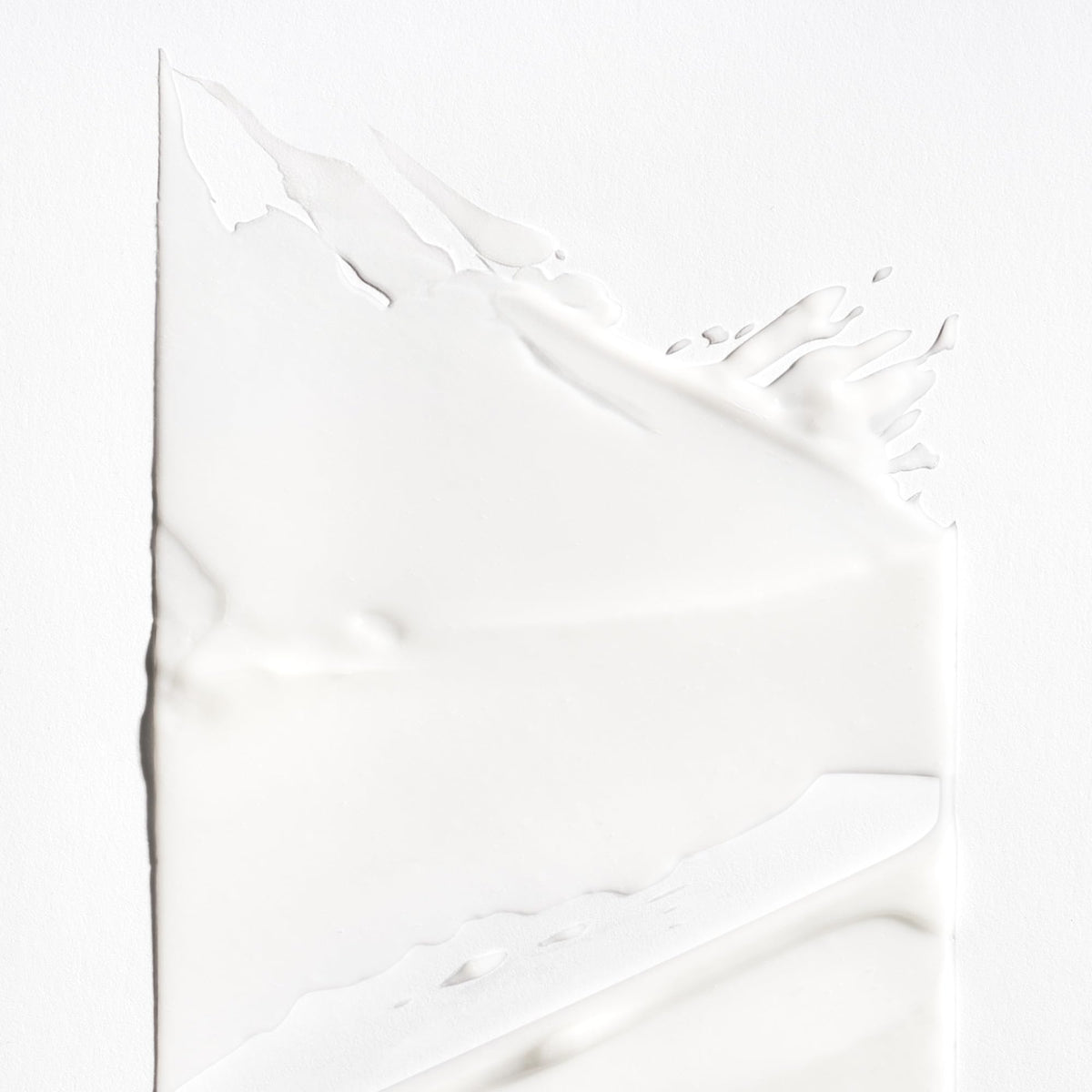 Briogeo Curl Charisma cream texture highlights hydrating, detangling benefits.