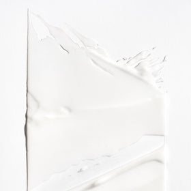 Briogeo Curl Charisma cream texture highlights hydrating, detangling benefits.