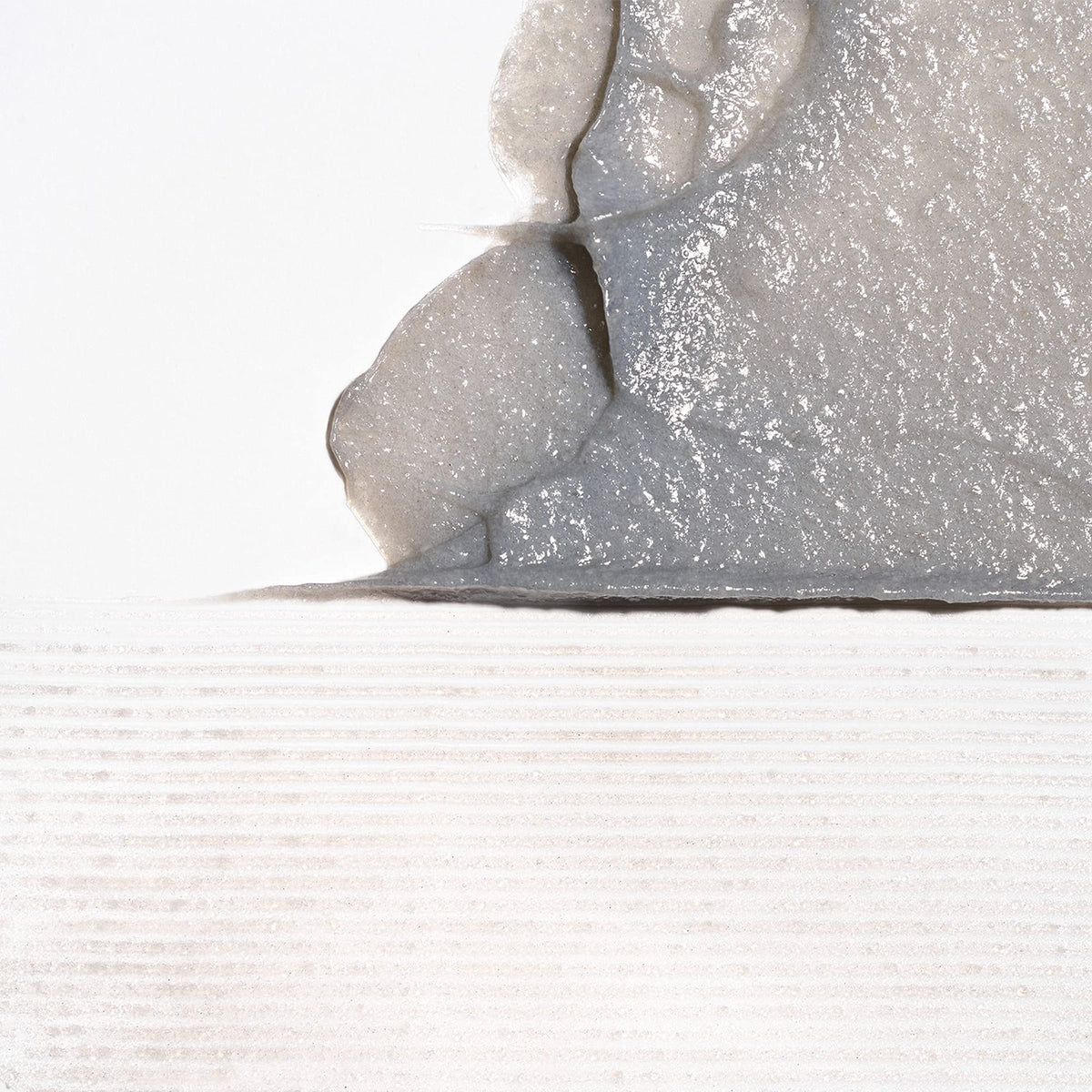 Briogeo Scalp Revival micro-exfoliant particles demonstrate gentle debris removal.