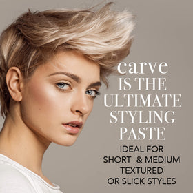 Hands applying Carve Texture Paste to damp hair for defined texture.