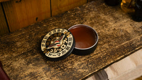 BROSH Far East Hard Pomade on a bathroom shelf.