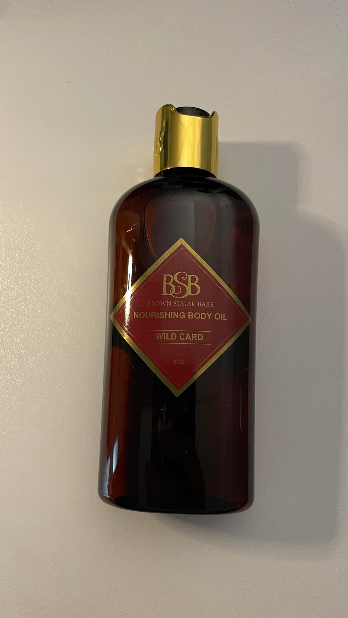 Brown Sugar Babe Wild Card oil on vanity evokes luxurious daily self-care