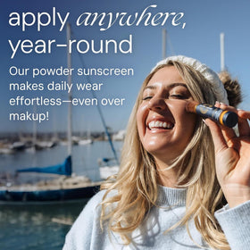 Brush On Block Touch of Tan providing a sheer warmth with a sun-kissed look