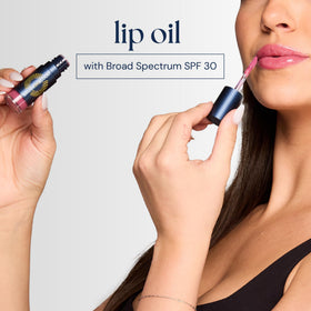 Brush On Block Lip Oil SPF 30 glossy finish highlights mineral protection.