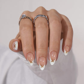 BTArtbox press-on nails, short white French tip with bow, for a chic, salon-inspired look.