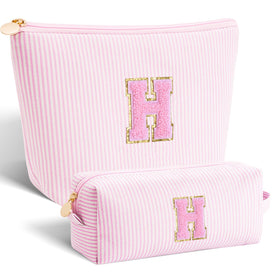 Btffitting monogram cosmetic bag in pink, front view, ideal daily storage.