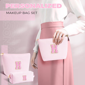 Btffitting monogram cosmetic bag pink large and small bags shown together.