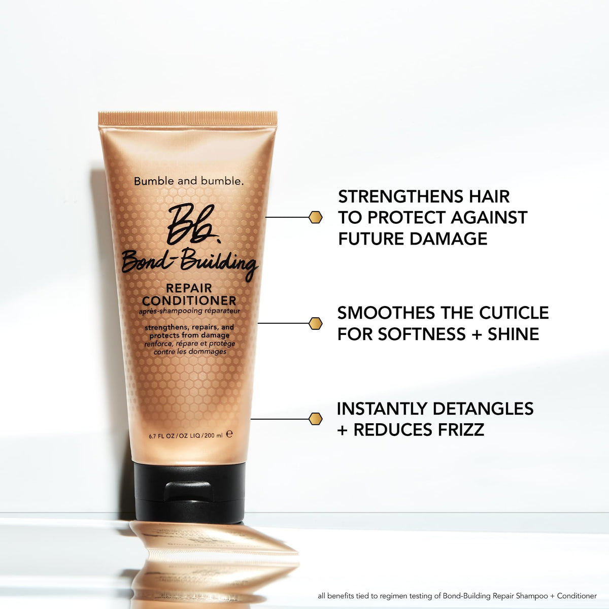 Bumble and bumble Bond-Building Hair Repair Conditioner in use shows detangling and smoother strands.
