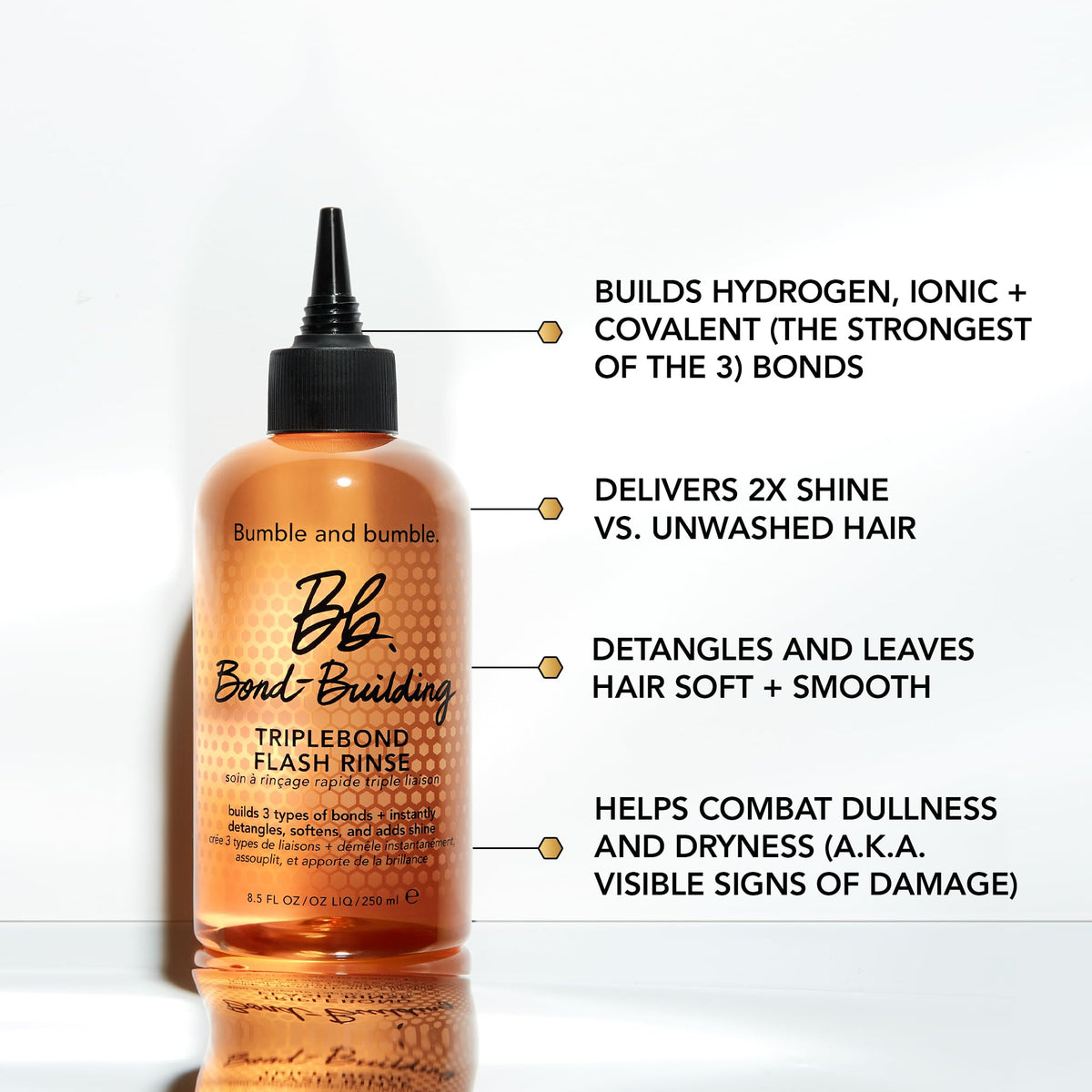 Bumble and bumble Bond-Building Rinse applied-on-damp-hair scene shows detangling.