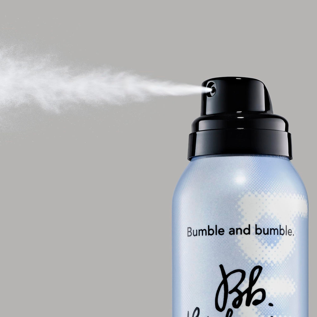 Compact packaging of Bumble and bumble Dryspun Texture Spray Light for travel touch-ups.