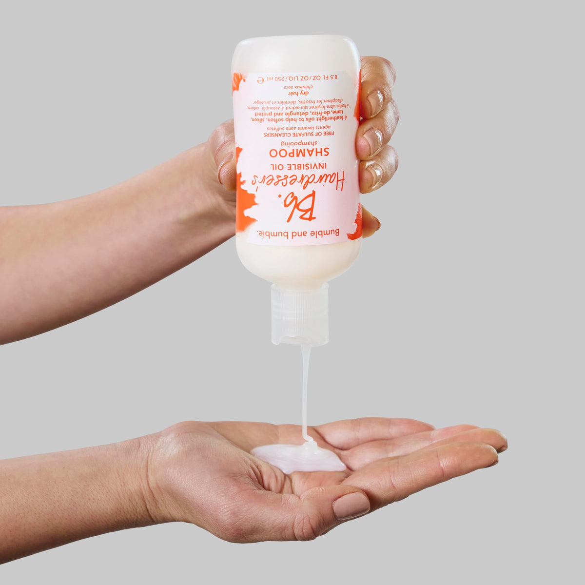 Bumble and bumble label emphasizes color-safe, featherlight oil blend