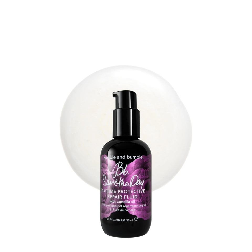 Bumble and bumble Save the Day bottle closeup highlights restorative softening for damaged hair.