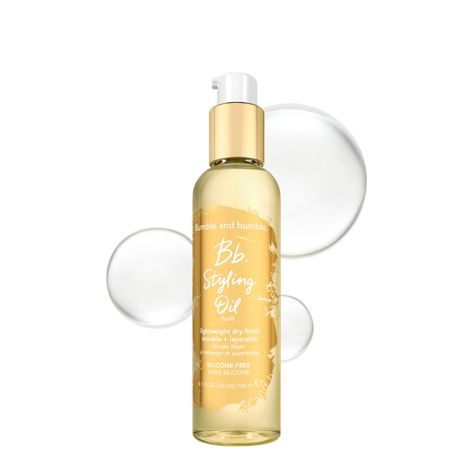 Bumble and bumble Styling Oil bottle pour shows easy application for silky, frizz-free hair.