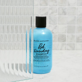 Liter-sized Bumble and bumble Sunday clarifying shampoo jar ready for use
