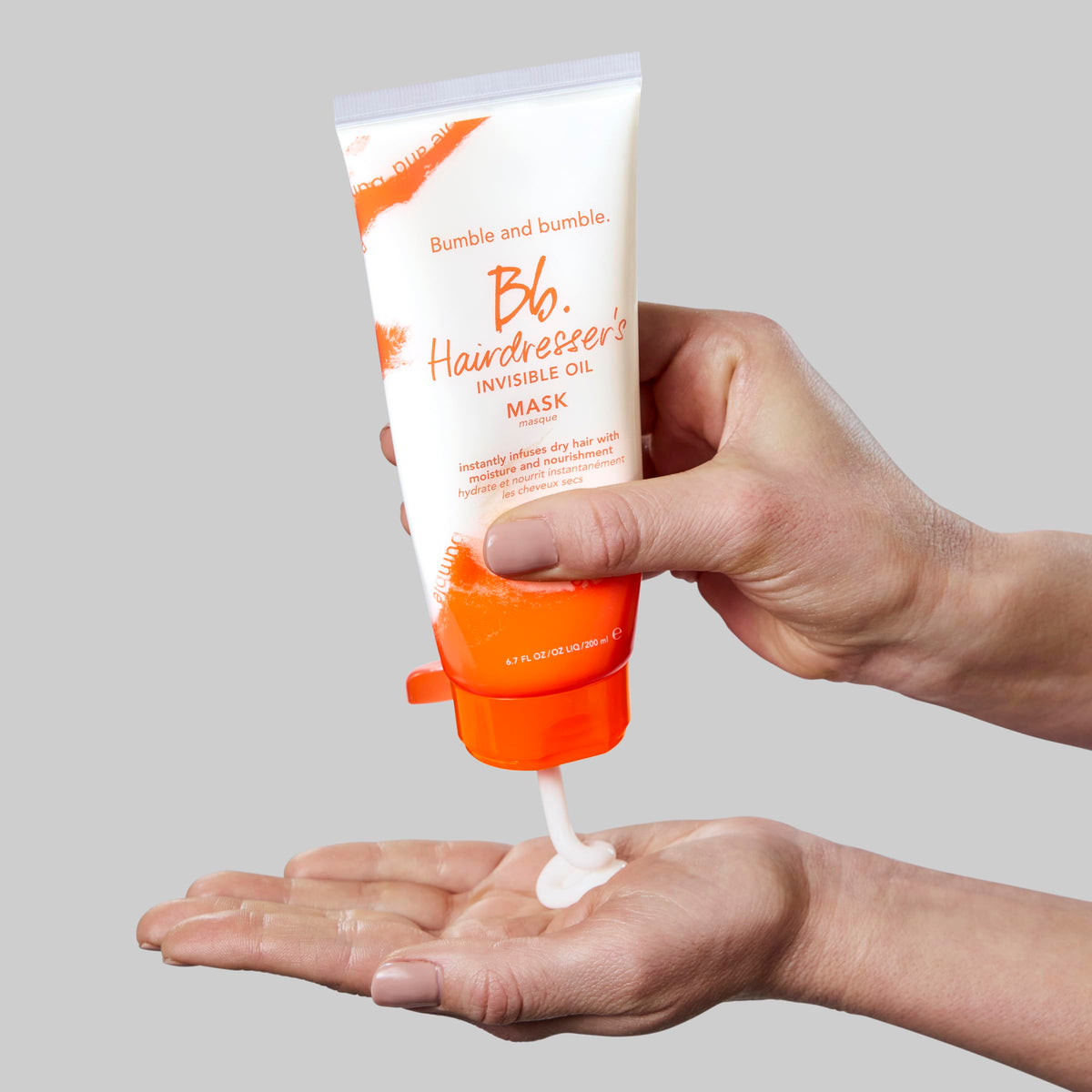 Bumble and bumble Hydrating Mask with argan oil drops nourishes strands.