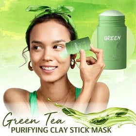 Hand applying Bupposes Green Tea Mask Stick to the face for quick cleansing.