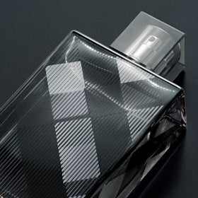 Burberry Brit for Him cedar wood heart, adds warm depth