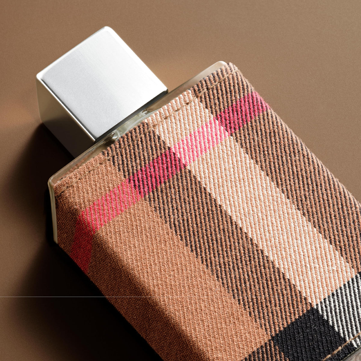 Close-up of Burberry London label highlighting premium craftsmanship.
