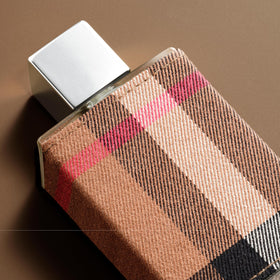 Close-up of Burberry London label highlighting premium craftsmanship.
