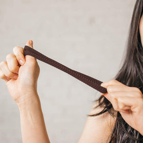 Burlybands eight-piece set of large hair ties for voluminous hair.