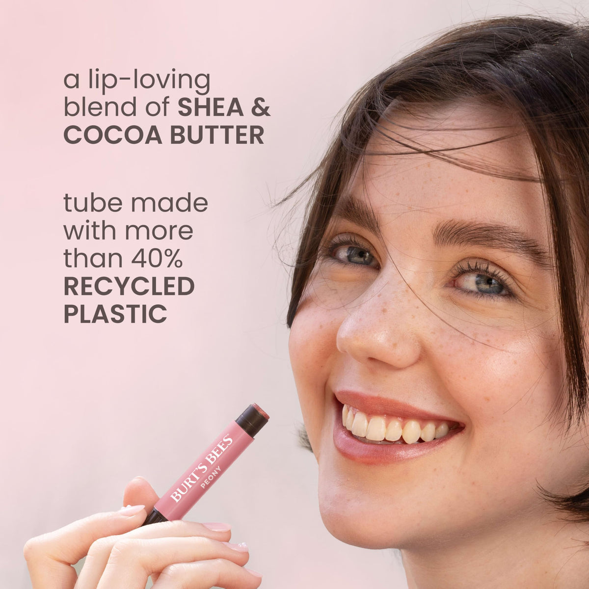 Packaging shows Burt's Bees Lip Shimmer Raisin with recyclable carton.
