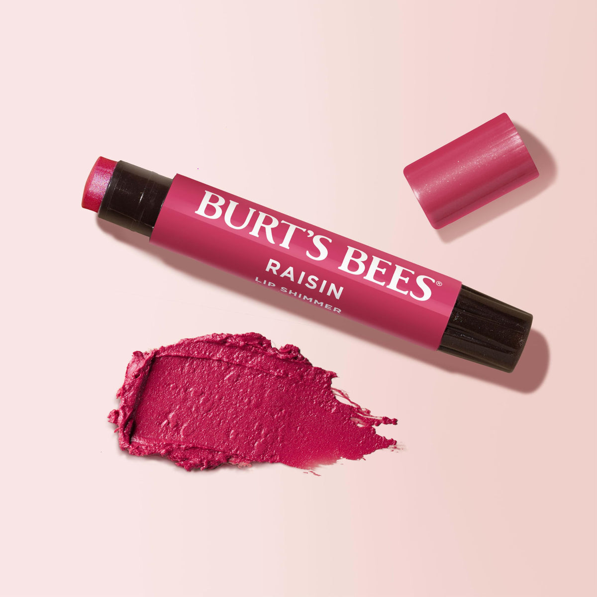 Recyclable carton emphasizes Burt's Bees Lip Shimmer Raisin sustainability.