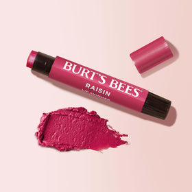 Recyclable carton emphasizes Burt's Bees Lip Shimmer Raisin sustainability.