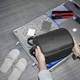 Buruis toiletry bag water-resistant finish protects contents during travel.